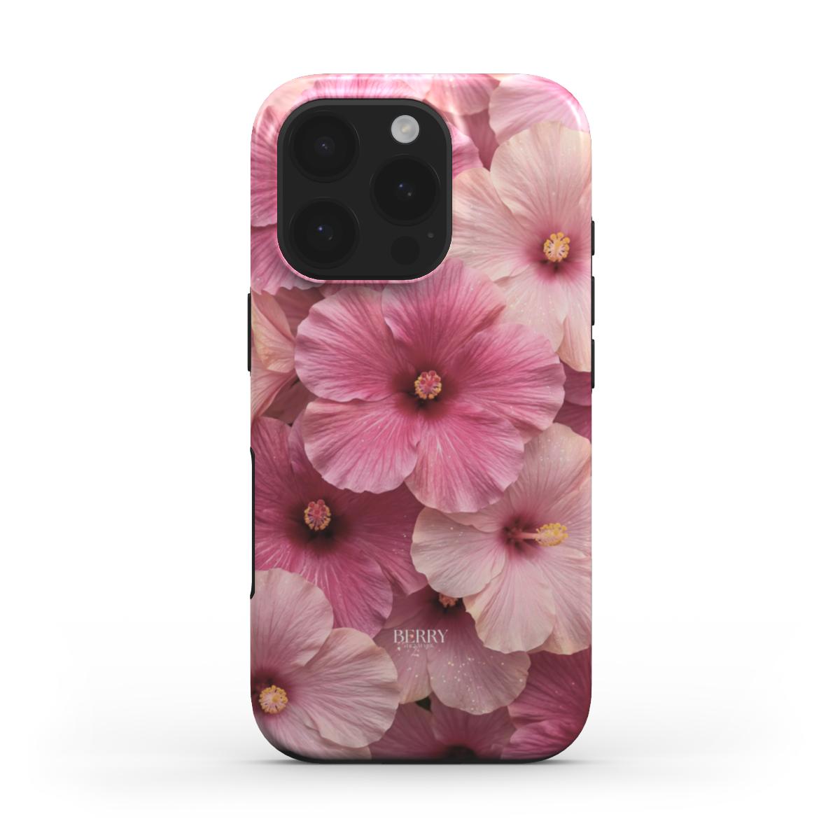 Phone case featuring a trendy floral pattern in pink and red hues, showcasing a feminine and beautiful aesthetic with multicolored blush flowers.