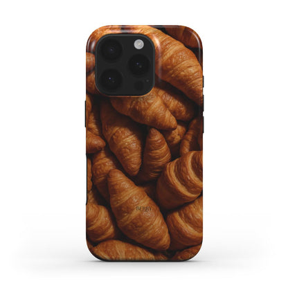 Phone case featuring a trendy and feminine design with a brun, flerfarvet pattern of crispy croissants for a beautiful, popular aesthetic look.