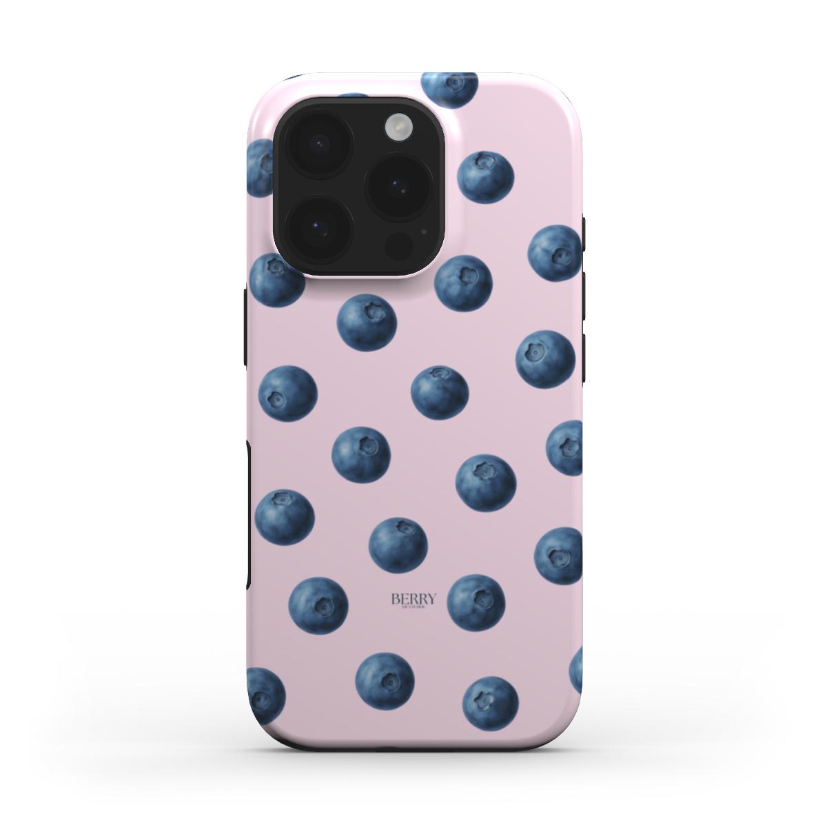 Trendy feminine phone case with pink background and blue blueberry pattern, showcasing a beautiful girly aesthetic and playful colorful design.