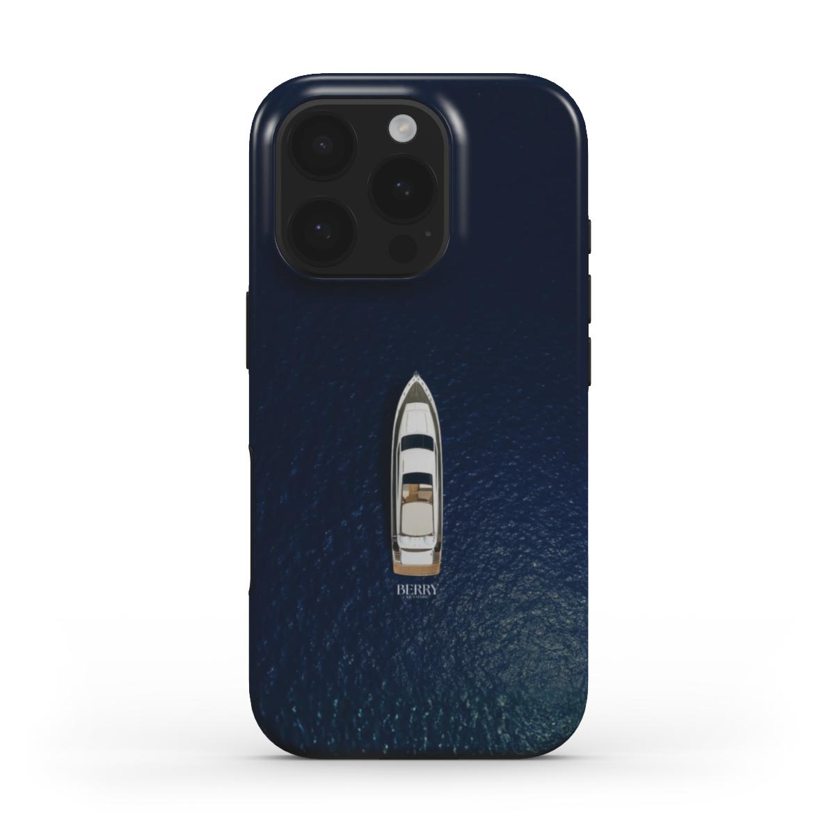 Trendy phone case featuring a sleek boat design on deep blå water for a feminine and popular aesthetic with a multicolored pattern.
