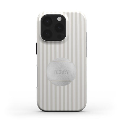 Trendy phone case with beige and white vertical stripes featuring a soft, feminine tennis ball design for a popular, aesthetic, and girly look.