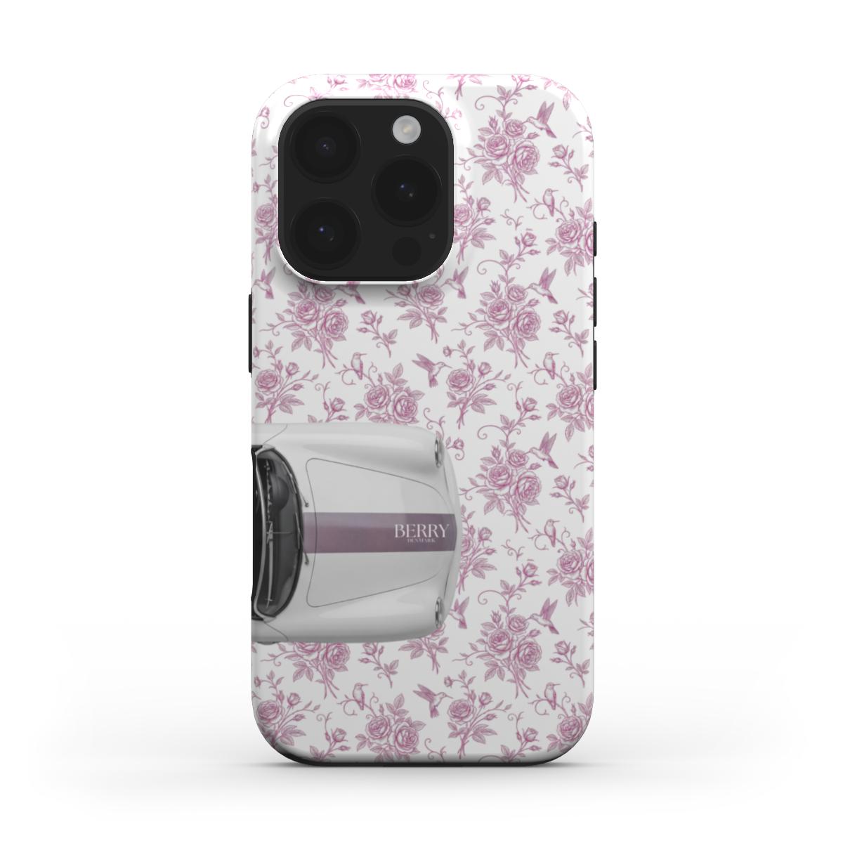 Trendy feminine phone case with multicolored pink and white floral pattern featuring a stylish vintage car design, perfect for that girly aesthetic.