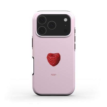 Trendy feminine phone case in pink with a realistic red raspberry heart design, combining girly charm with a beautiful and popular aesthetic.