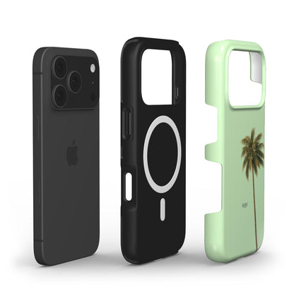 Trendy slim phone case set featuring a matte black protective case and a feminine beige and green case with a palm tree design and colorful accents.