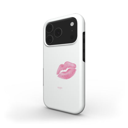 Trendy white phone case with a pink lipstick kiss print, offering a feminine and stylish look perfect for a popular girly aesthetic.