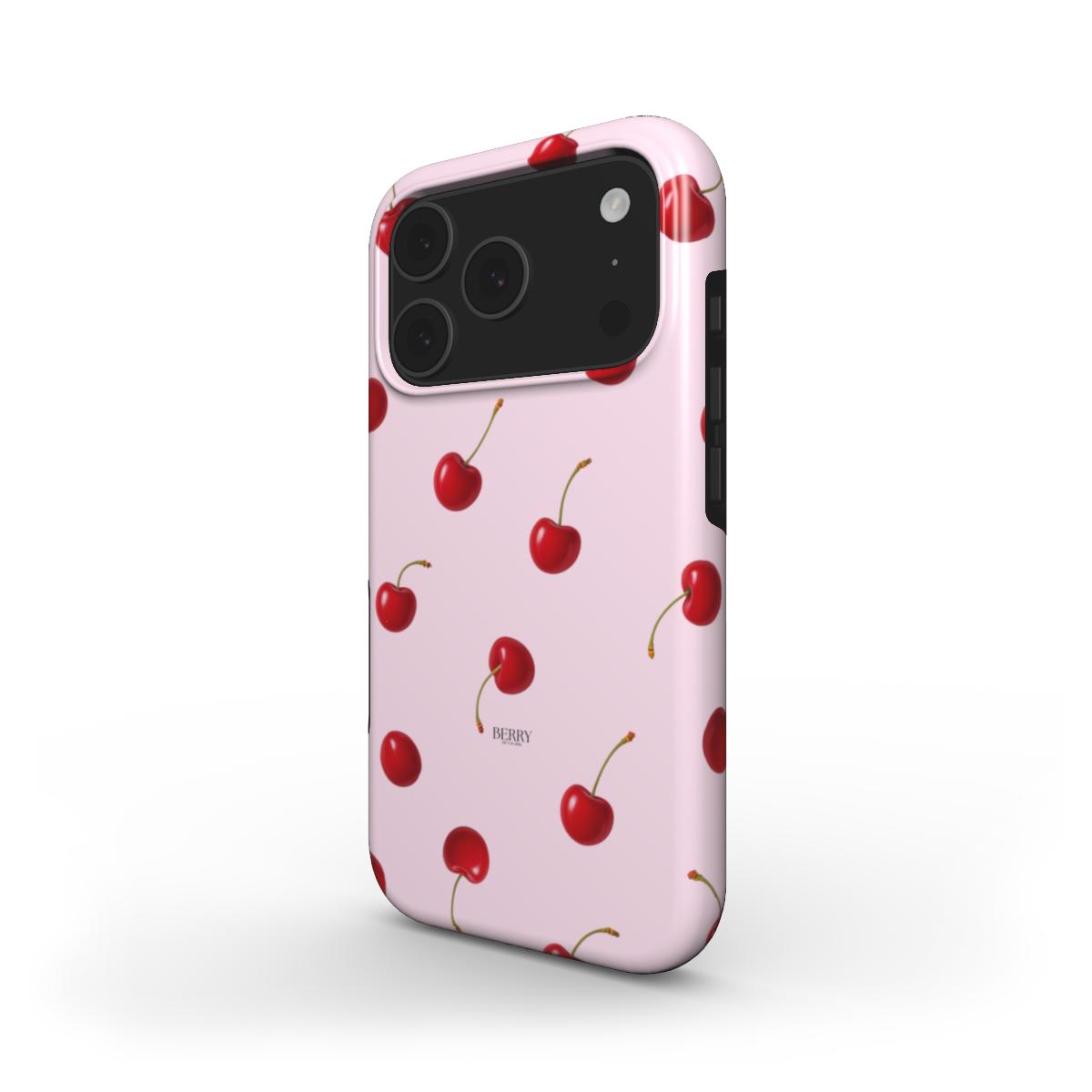 Trendy pink phone case adorned with vibrant red cherries on a girly, feminine design perfect for that beautiful, popular aesthetic look.