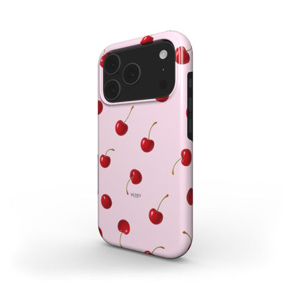 Trendy pink phone case adorned with vibrant red cherries on a girly, feminine design perfect for that beautiful, popular aesthetic look.