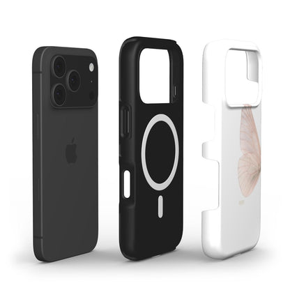 Black MagSafe phone holder and white phone case with a delicate pink butterfly design, showcasing a trendy and feminine aesthetic.