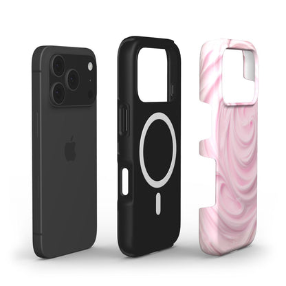 Trendy phone case with a pink, flerfarvet swirl pattern designed for a feminine and aesthetic look, complementing a sleek black smartphone.
