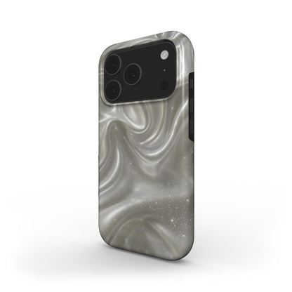 Trendy phone case in silver with a dreamy, silky swirl pattern and subtle sparkling details, combining elegant and feminine aesthetic appeal.