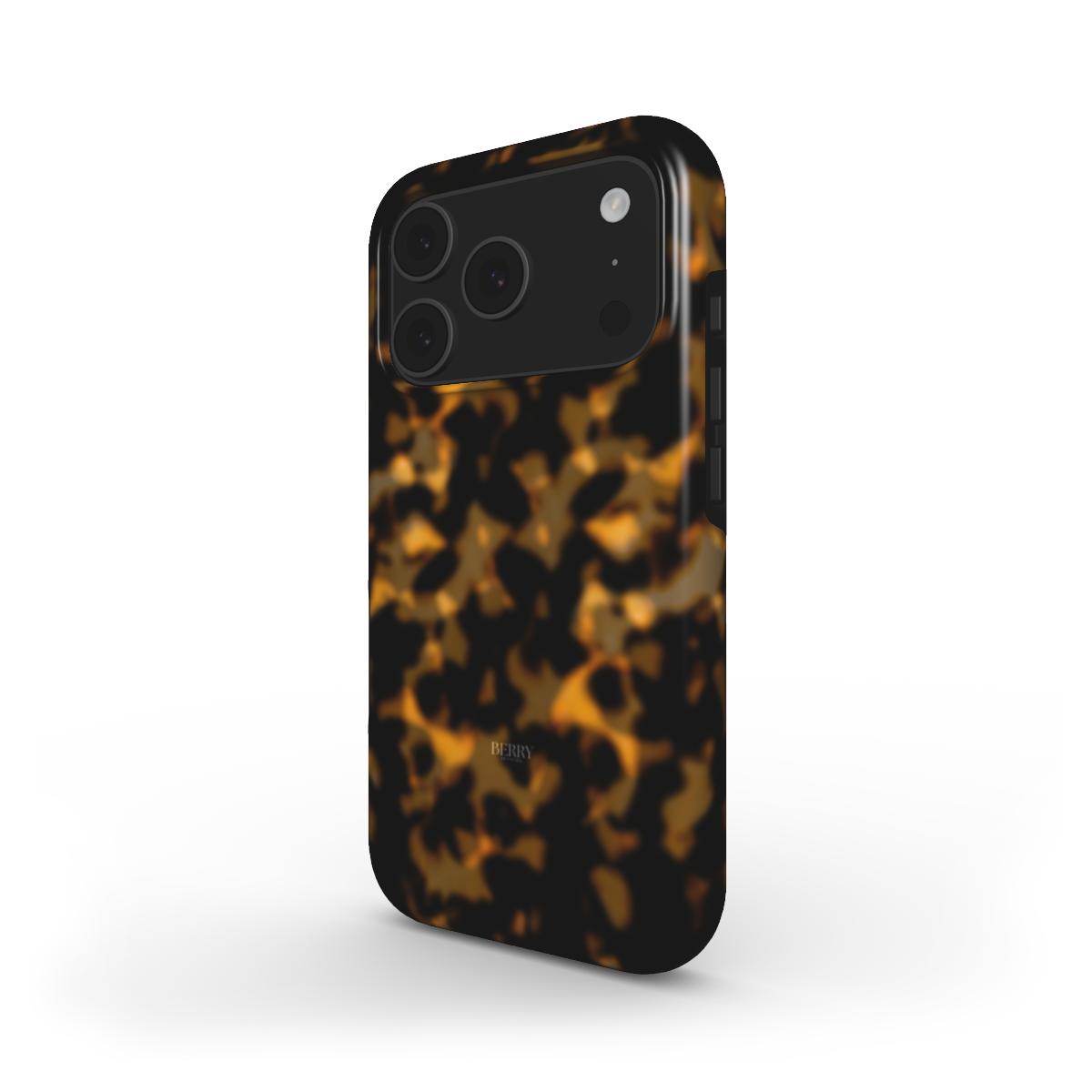 Trendy phone case with a feminine tortoise shell pattern in brun, guld, orange, and flerfarvet creating a beautiful, aesthetic look.