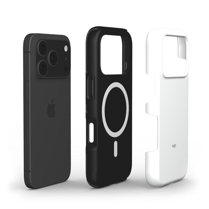 Black and white minimalist phone cases featuring a sleek, trendy design with clean lines and a circular wireless charging compatible pattern on the black case.