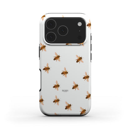 White phone case with a colorful bee pattern, featuring a feminine and trendy design perfect for a stylish and popular look.
