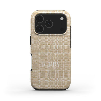 Beige textured phone case with a minimalist woven pattern, offering a trendy and feminine look inspired by Bali's aesthetic.