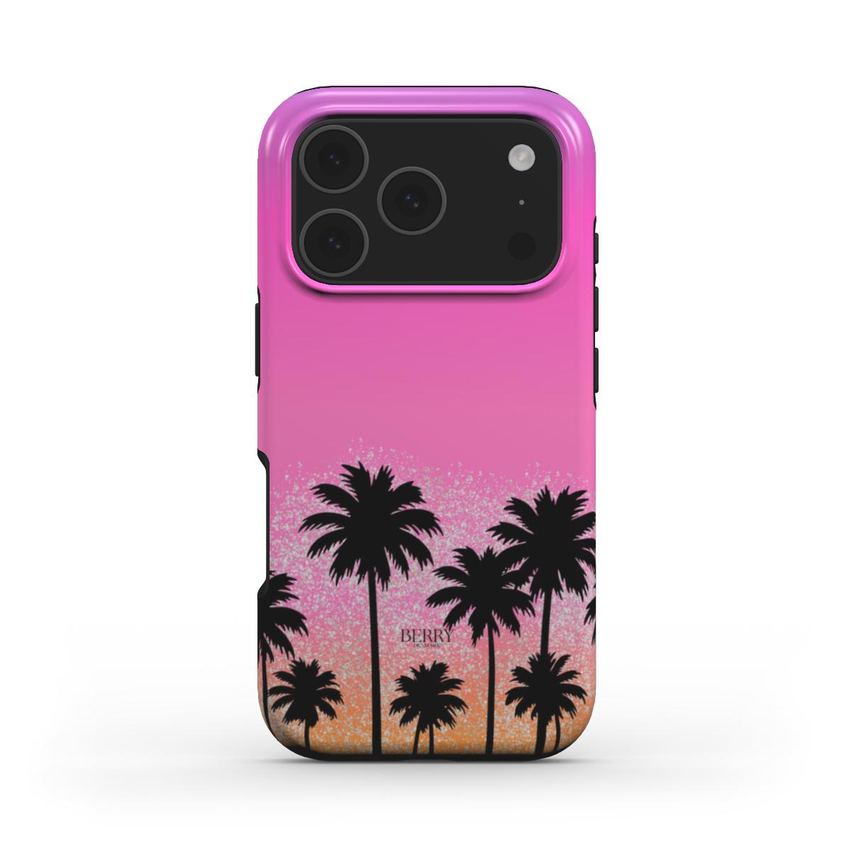 Trendy phone case with a pink and orange gradient featuring black palm tree silhouettes, creating a girly and feminine aesthetic inspired by an L.A. sunset.