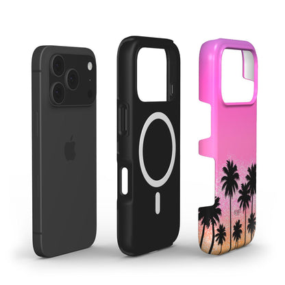 Trendy pink and orange phone case with a magnetic ring and palm tree sunset pattern, combining girly and feminine aesthetic for a popular stylish look.