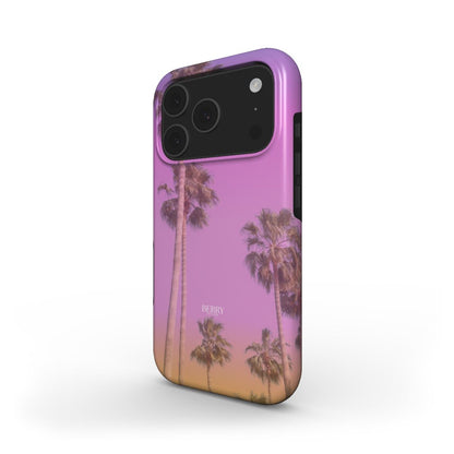 Trendy phone case with a beautiful multicolored gradient of orange, pink, and purple featuring feminine palm tree design for a stylish and popular look.
