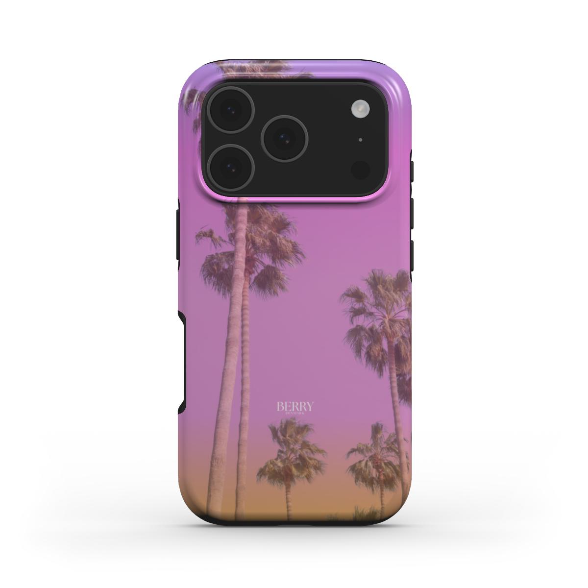 Trendy phone case with a purple and orange gradient background featuring tall palm trees, showcasing a feminine and aesthetic design with colorful hues.