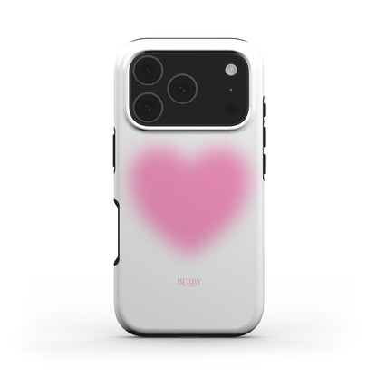 Trendy phone case with a soft, feminine pink heart design, featuring a blurred, aesthetic look that’s popular among those who love stylish and girly accessories.