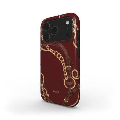 Trendy burgundy phone case featuring elegant gold chain and leather strap patterns in brown, beige, and red for a feminine and beautiful look.