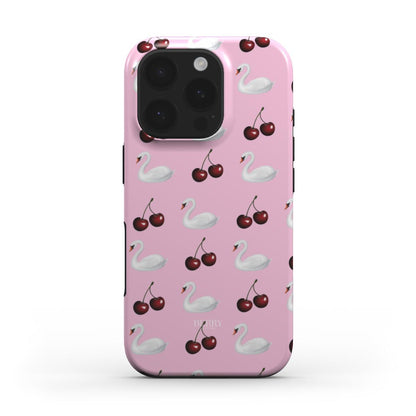 Pink phone case with a trendy pattern of white swans and red cherries, featuring a girly and feminine aesthetic perfect for that popular stylish look.