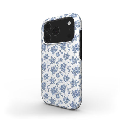 Trendy phone case with a feminine, multicolored white and blue floral pattern evoking a beautiful, aesthetic garden-inspired style.