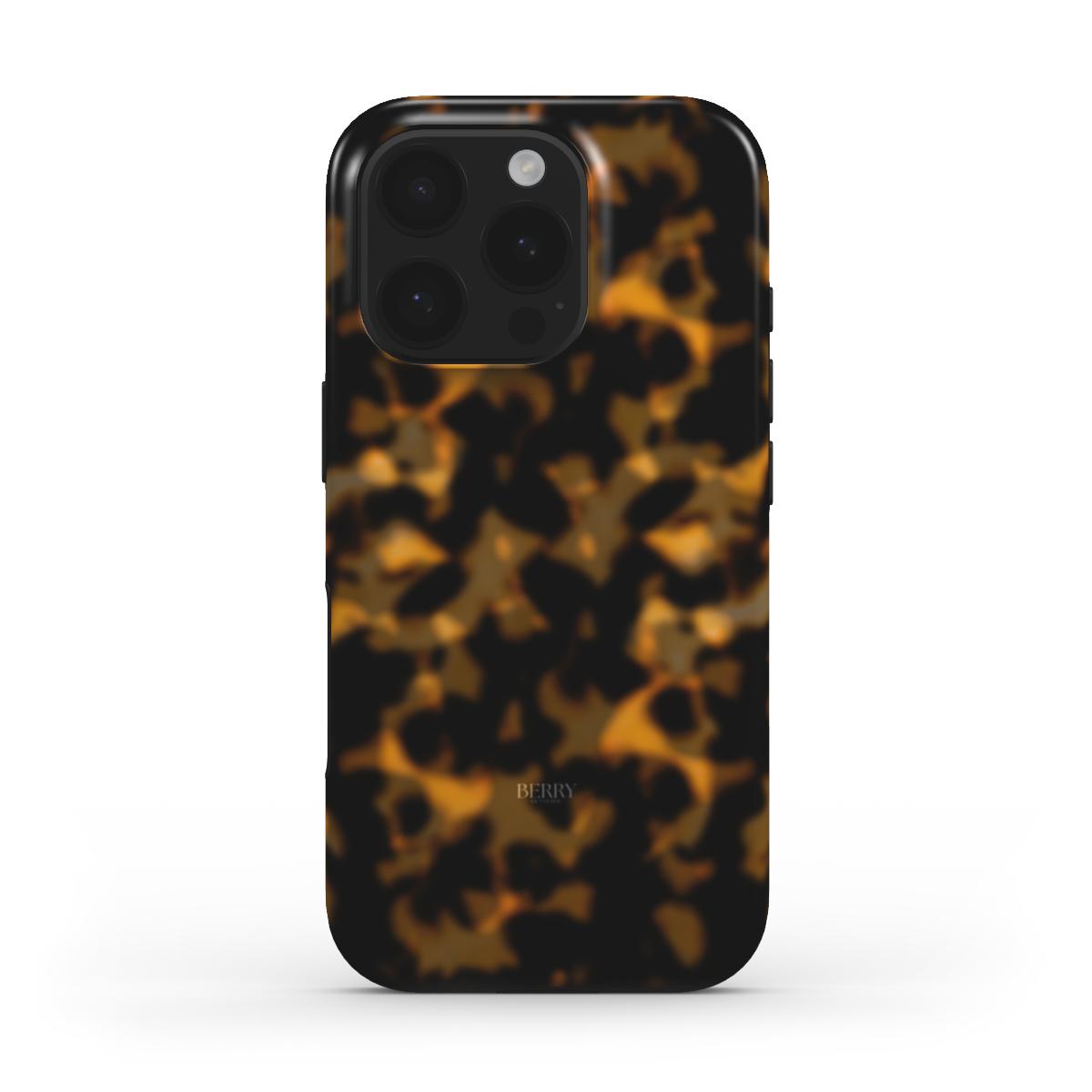 Trendy phone case with a multi-colored tortoise shell pattern in brun, gold, and orange offering a stylish and feminine aesthetic.