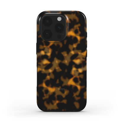 Trendy phone case with a multi-colored tortoise shell pattern in brun, gold, and orange offering a stylish and feminine aesthetic.